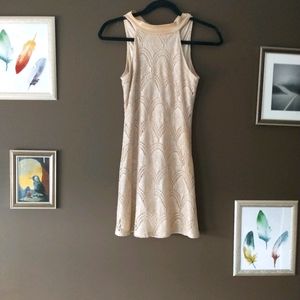 A unique sparkling crochet mini dress